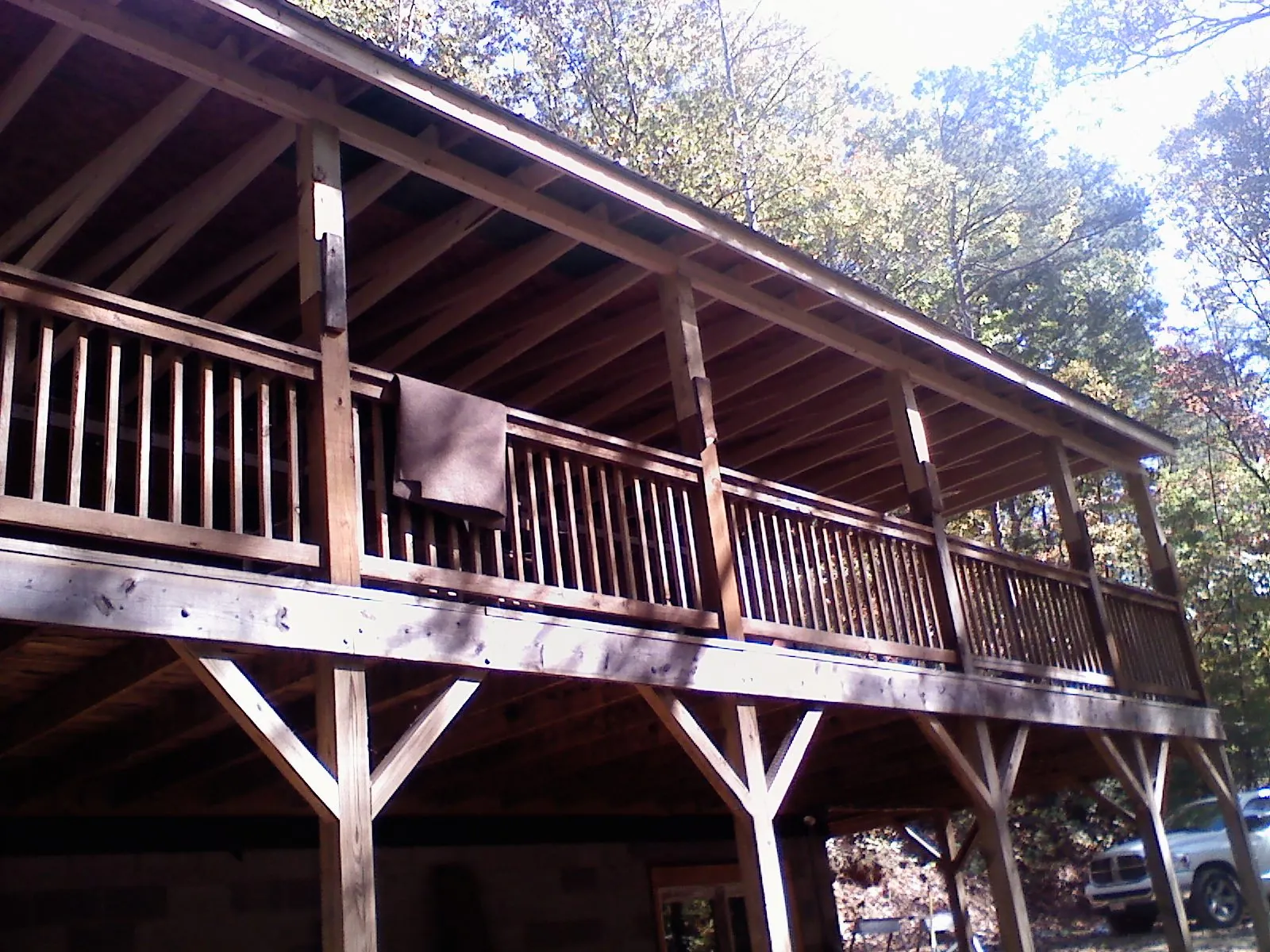 Timber framing under a new elevated porch and deck — Roof Leak Repair in Osterburg by Roofing Brothers